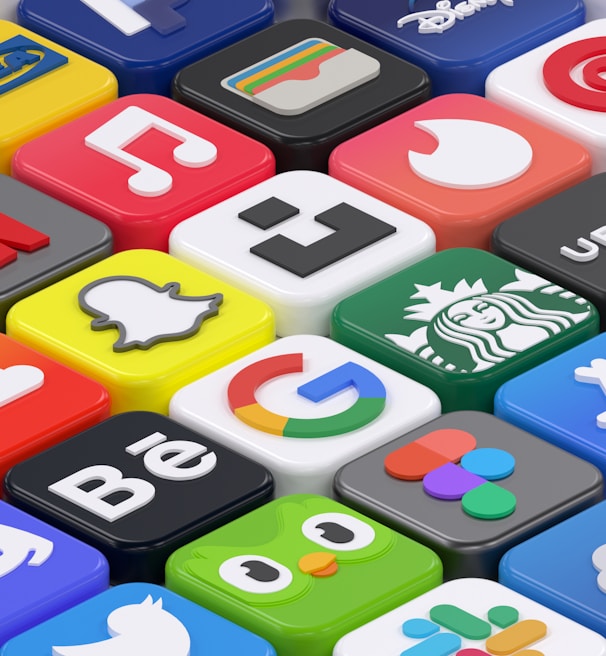 A collection of colorful 3D app icons arranged in a grid-like pattern, featuring well-known brands and services such as Spotify, Netflix, Discord, and Facebook. Each icon is distinct with vibrant colors and recognizable logos, giving a sense of modern digital culture.